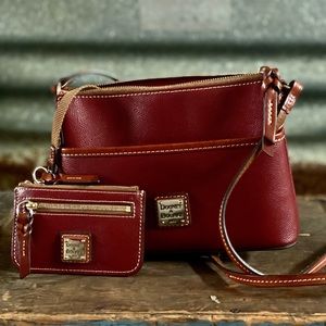 Dooney small crossbody with coin purse. Excellent condition